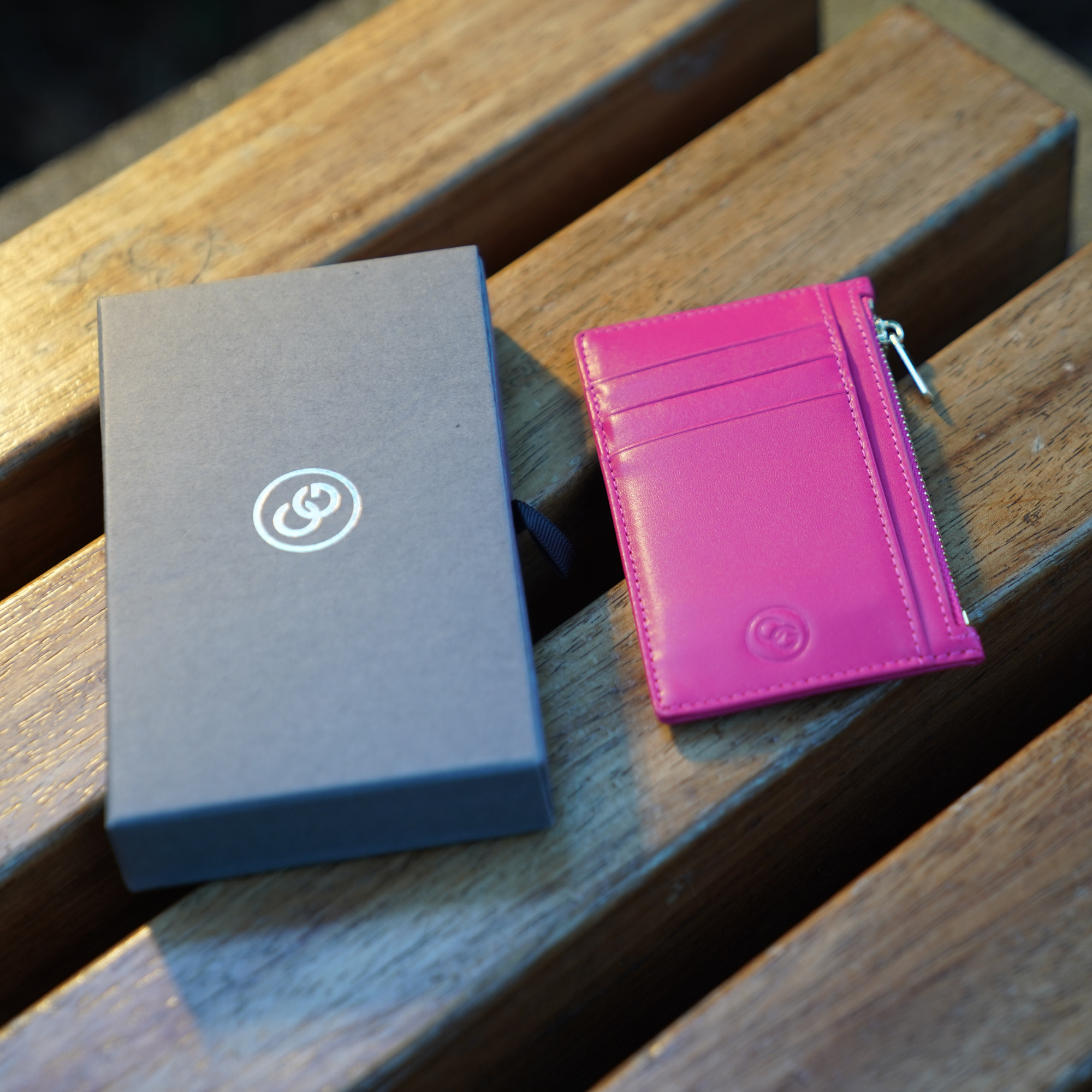 compact pink card holder with coin pouch